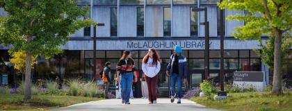 Students talking outside the McLaughlin Library