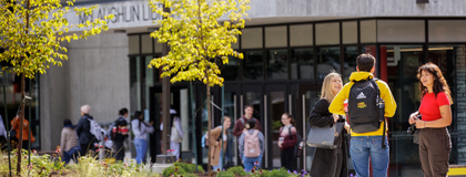 Students talking outside the McLaughlin Library